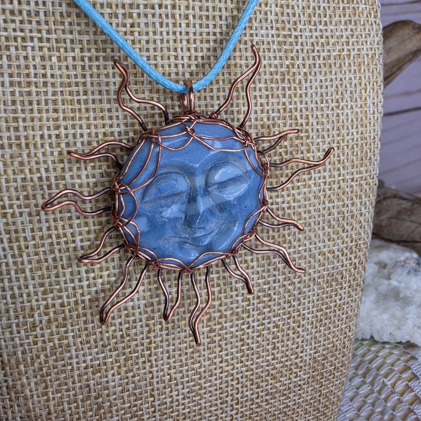 Copper-Wrapped Carved Plum Agate Pendant