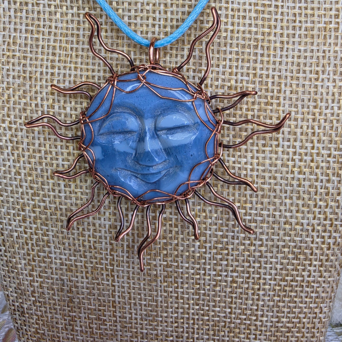 Copper-Wrapped Carved Plum Agate Pendant