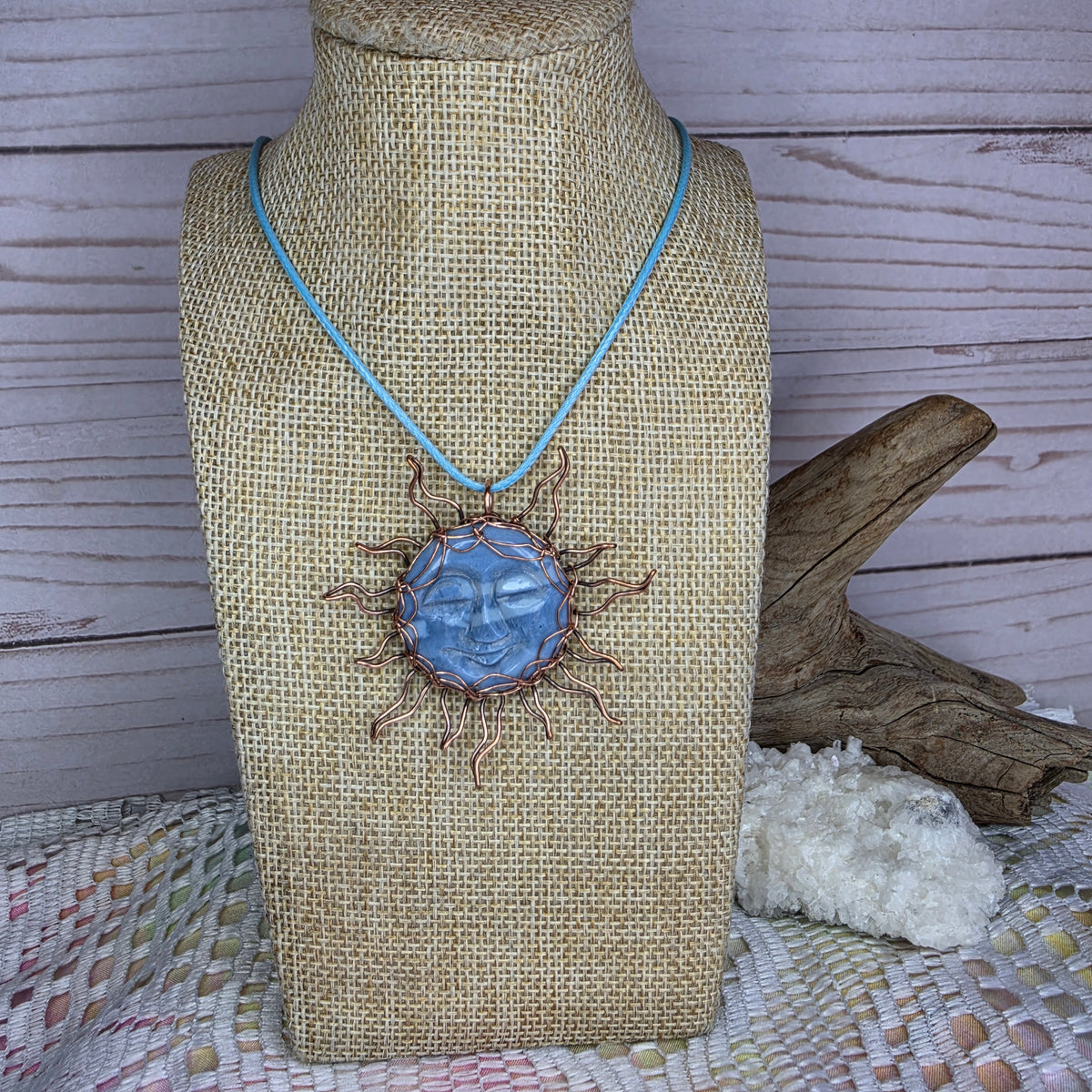 Copper-Wrapped Carved Plum Agate Pendant