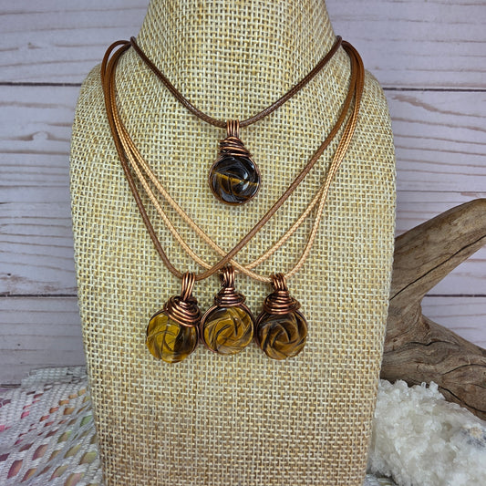 🐅 Copper-Wrapped Carved Tiger’s Eye Pendant